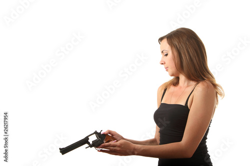 Girl is reload a revolver