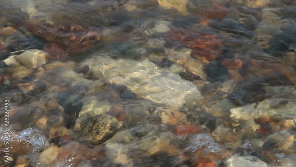 Pebbles in waves. Pebbles in waves.