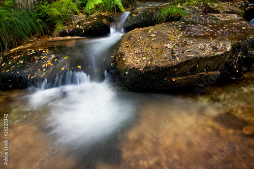 Small river waterfall at autumn in the portuguese national park
