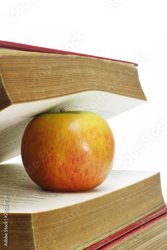 Red apple and old books
