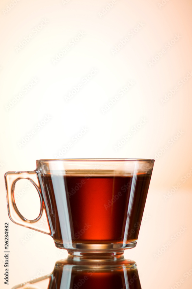 Cup of tea on the reflective surface Cup of tea on the reflective surface