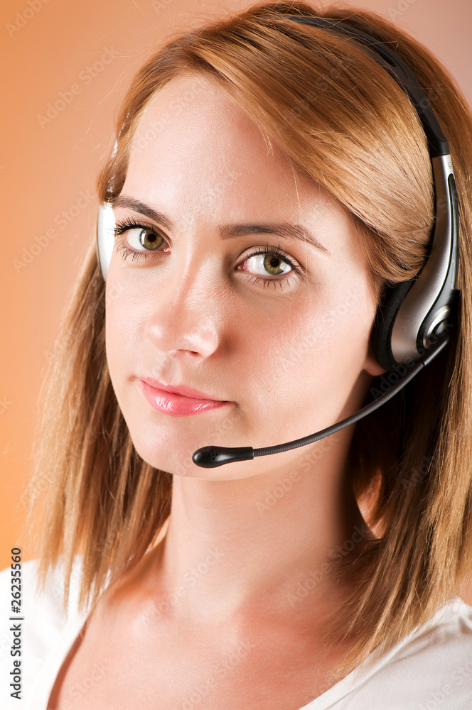 Young call center operator with the headset Young call center operator with the headset