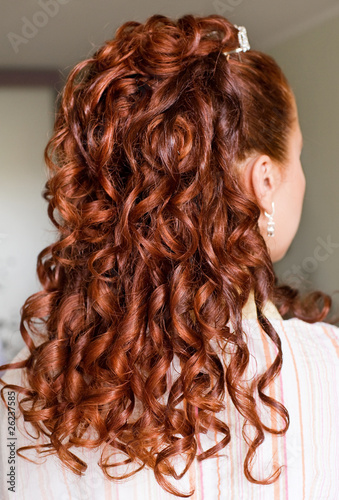 Wedding hair style with long red curly hair