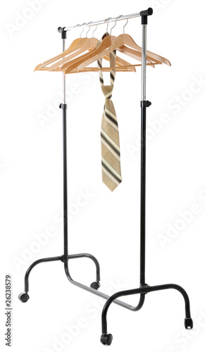 Hanger for clothes with tie , isolated on white a background © Tombaky