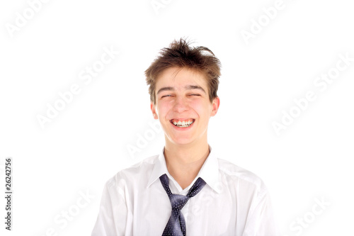 happy and laughing teenager isolated on the white