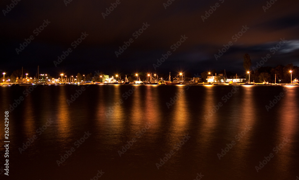 Port at dusk with a visible reflection
