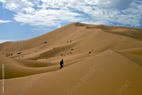 Man lost in desert dunes