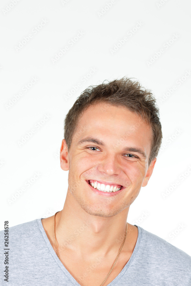 Handsome young man laughing. Isolated on white Handsome young man laughing. Isolated on white