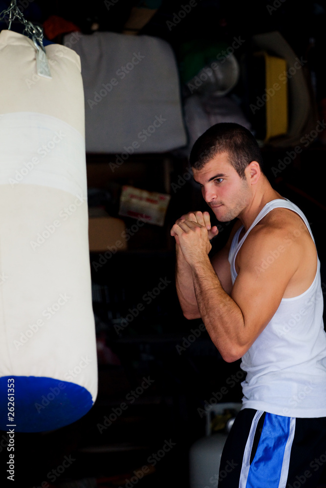 Fighter training in garage.