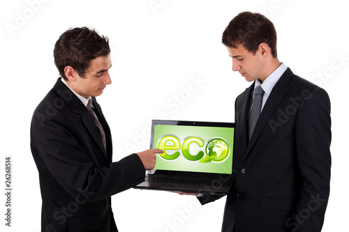 Business man pointing at eco laptop photo