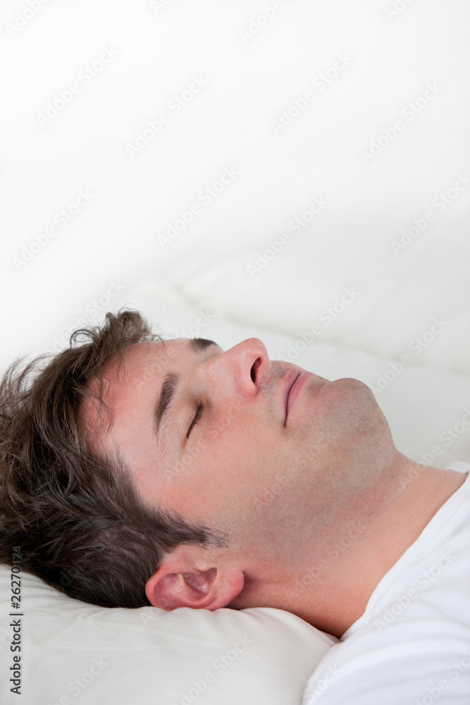 Portrait of a caucasian man sleeping on his bed Portrait of a caucasian man sleeping on his bed