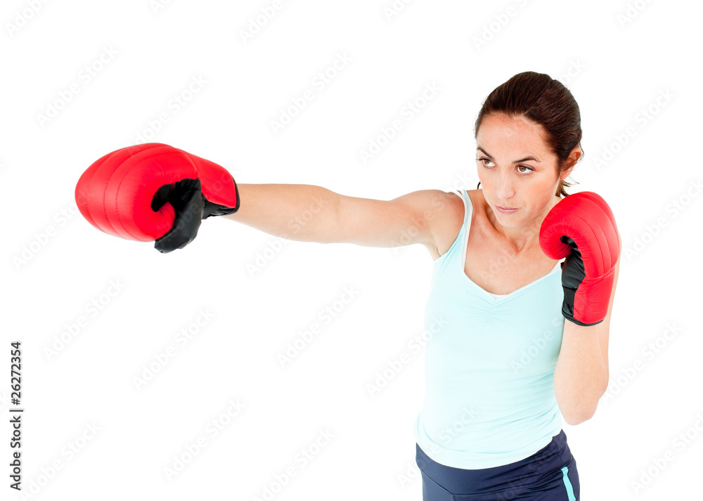 Athletic hispanic woman with boxing gloves working out