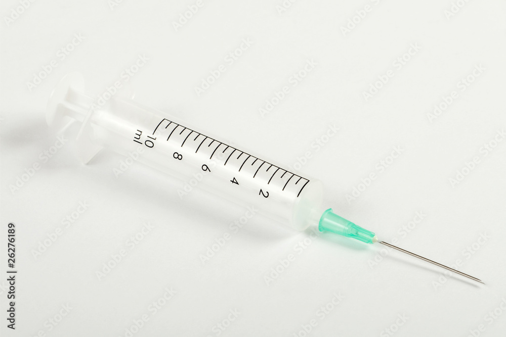 Syringe with needle isolated on white background Syringe with needle isolated on white background