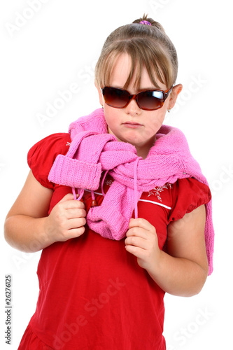 Proud small girl wearing sunglasses isolated on white