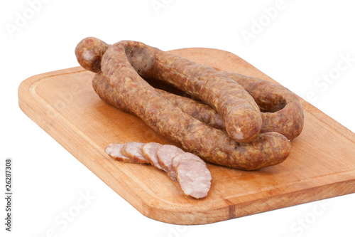 meat delicatessen on the board isolated on the white