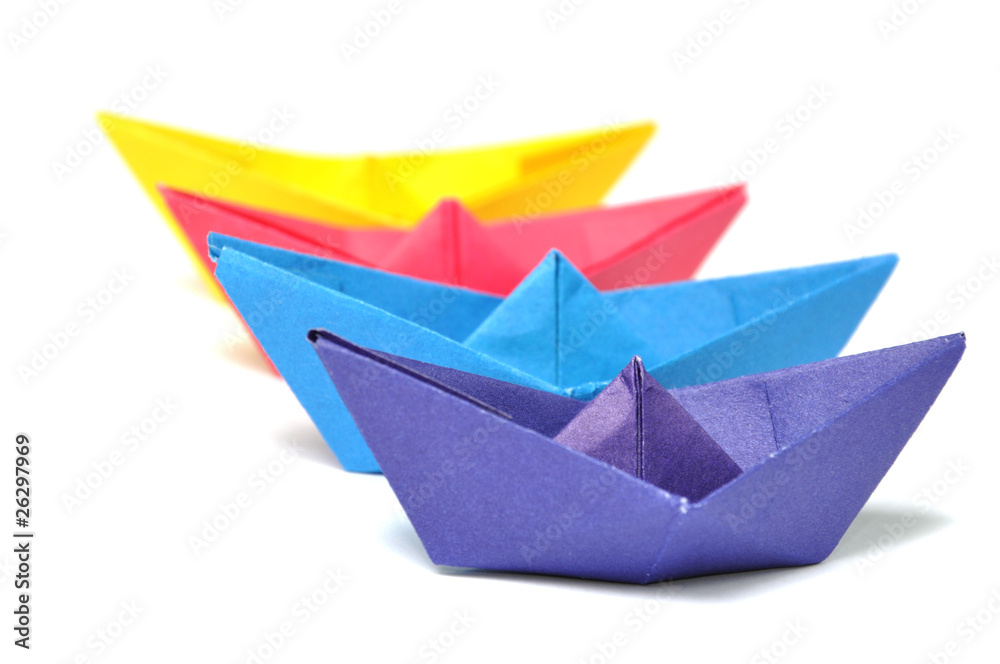 Close up origami ship over white