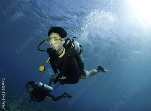 Asian scuba divers