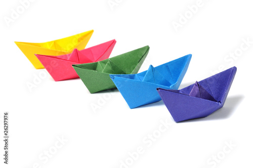 Close up origami ship over white
