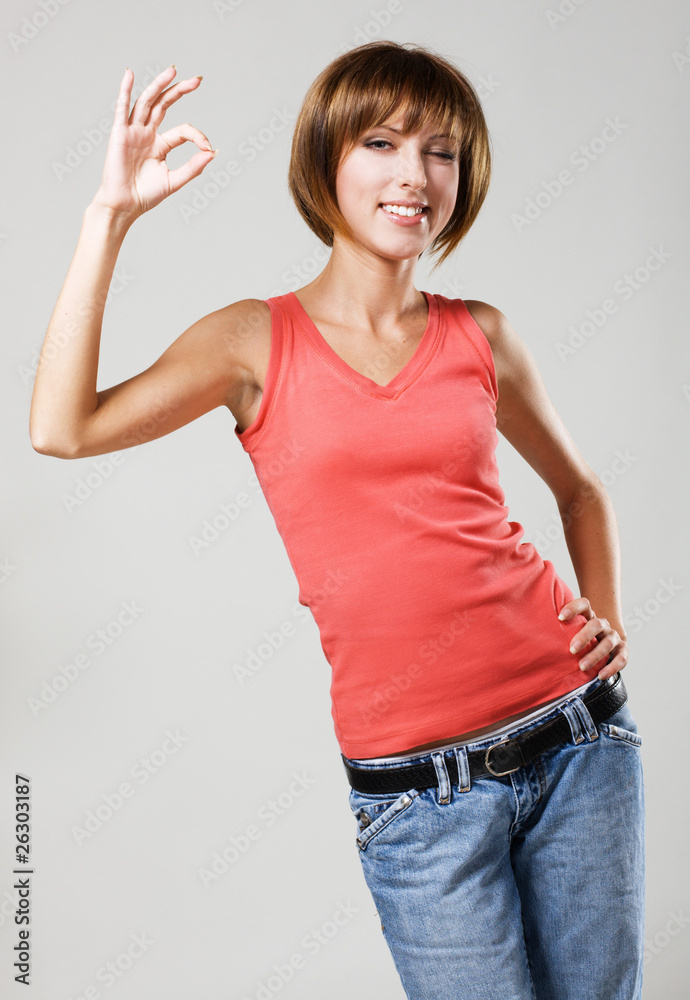 Young beautiful woman showing Young beautiful woman showing