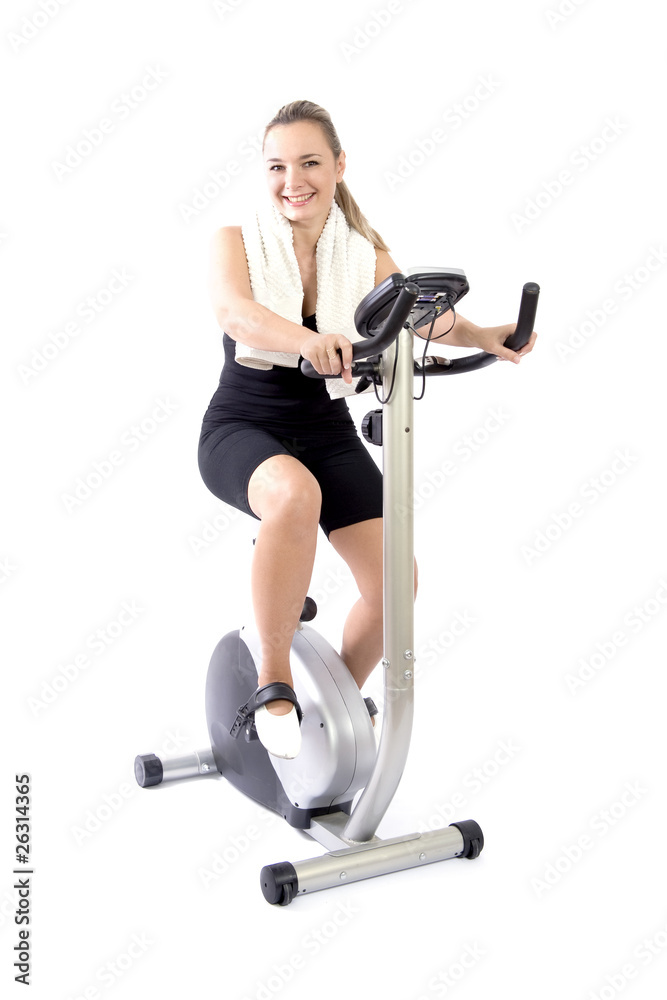 Obraz premium Woman exercising with bicycle indoor