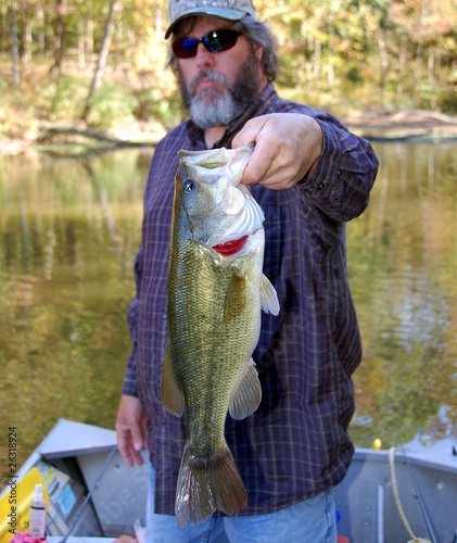 fisherman with bass