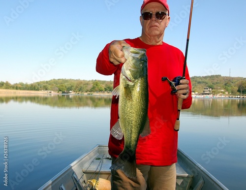 fisherman with bass