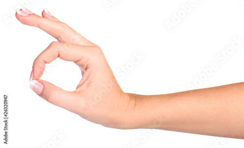 Woman's hand making sign Ok