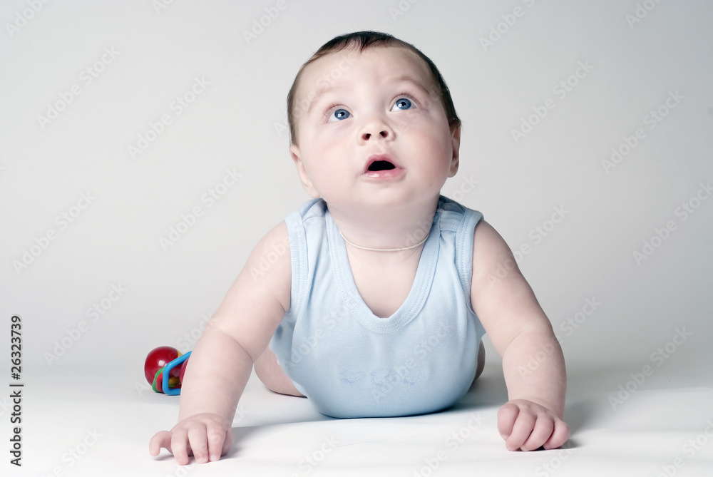 small child lifts a head upwards small child lifts a head upwards