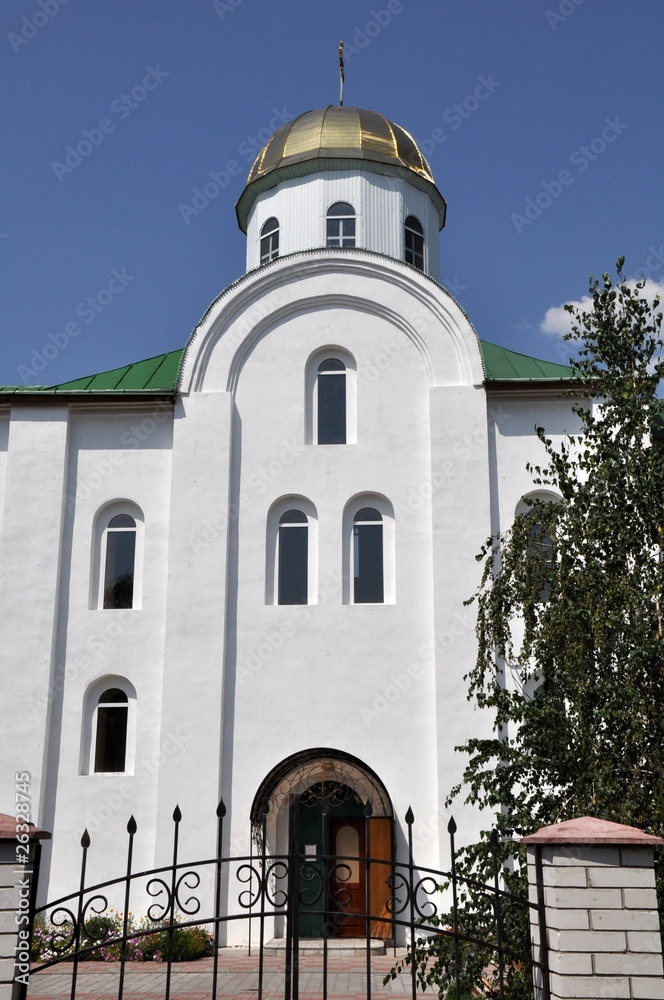 A tall white church building in Ukraine