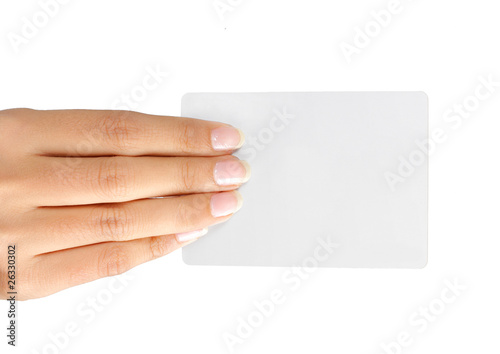 Gesture of a beautiful woman's hand showing a white card