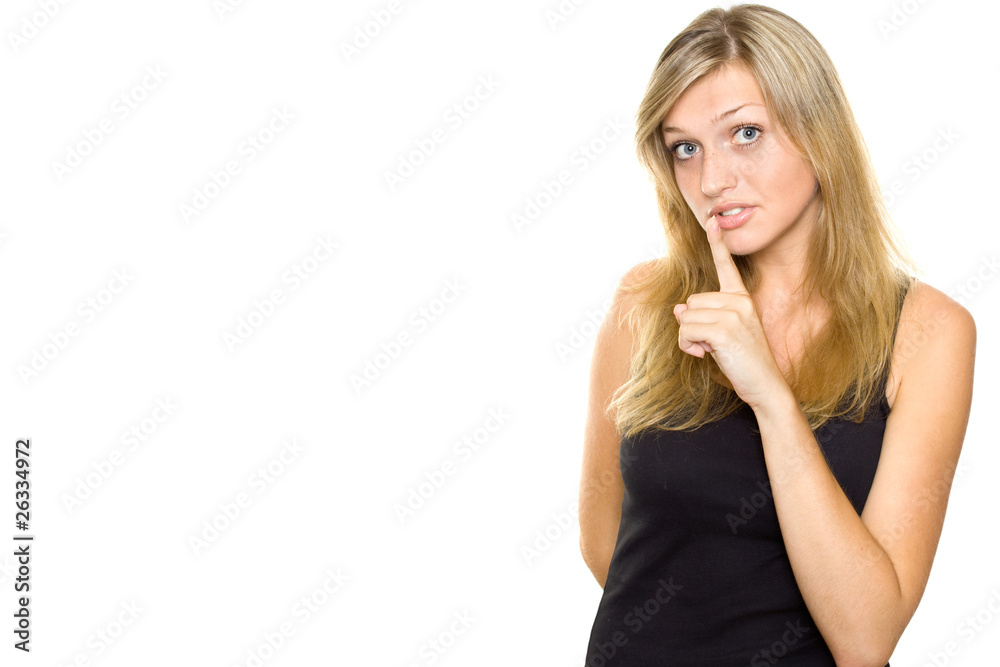 Young Woman Gesturing for Quiet or Shushing Young Woman Gesturing for Quiet or Shushing