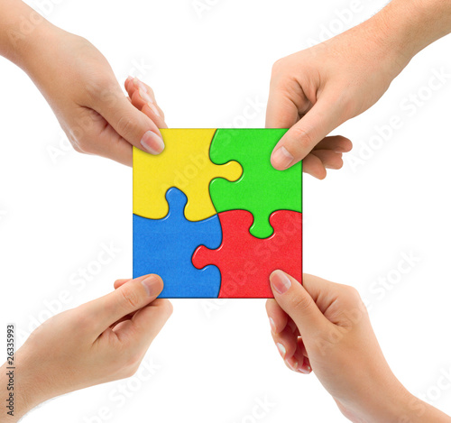 Hands and puzzle Team