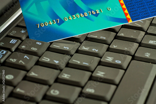 Credit card on notebook keyboard