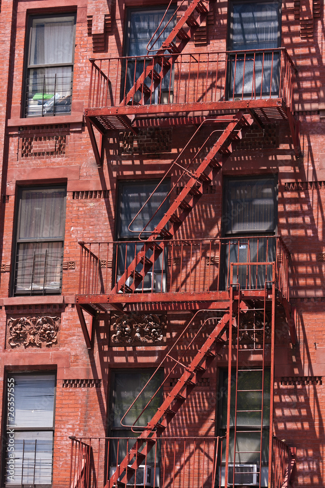 fire ladder at old houses downtown in New York fire ladder at old houses downtown in New York