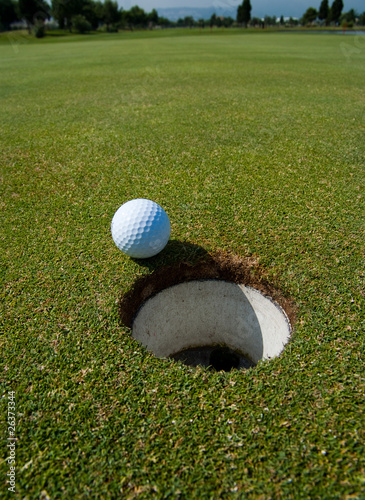 Golf ball close to the hole