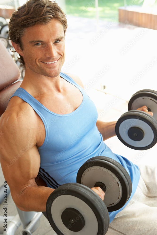 Man Working With Weights In Gym Man Working With Weights In Gym
