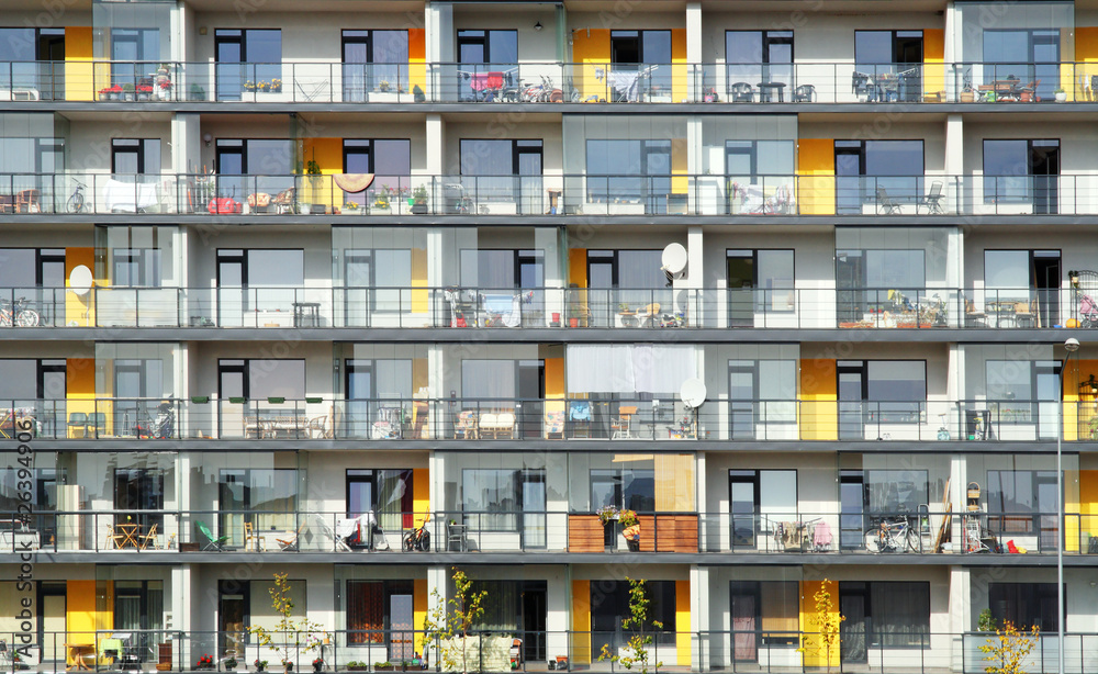 Windows and balconies of a multiroom apartment house Windows and balconies of a multiroom apartment house