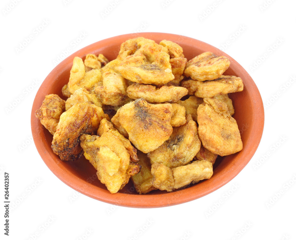 Cooked cinnamon banana in clay bowl Cooked cinnamon banana in clay bowl