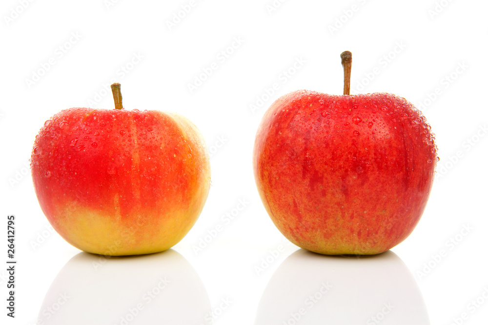 two juicy red apples over white background two juicy red apples over white background