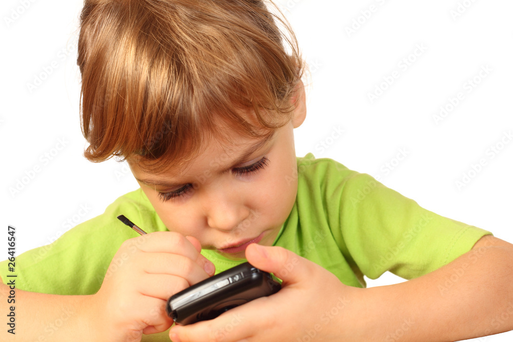 small girl in blouse found something interesting in telephone small girl in blouse found something interesting in telephone