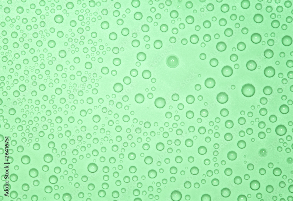 Abstract green background with many water bubbles.