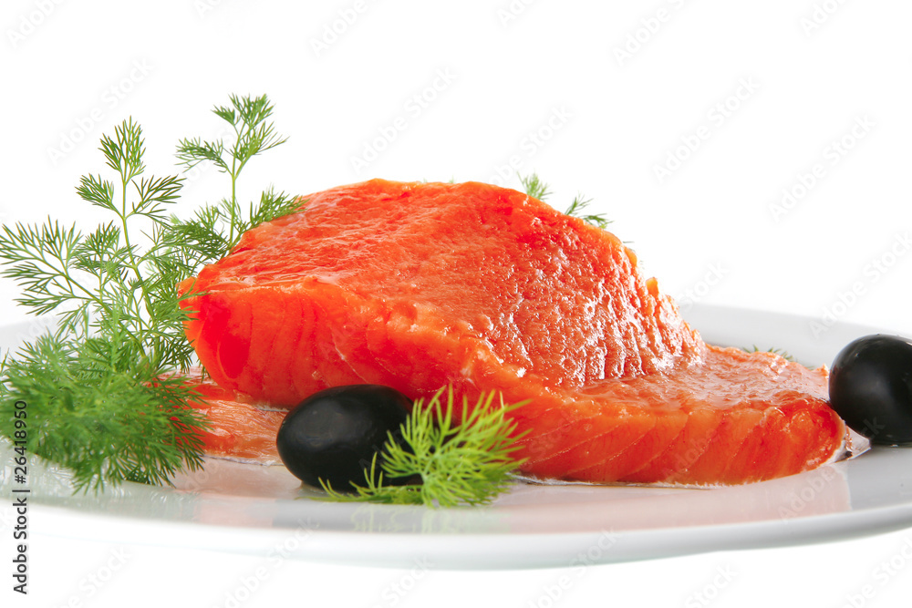 pink smoked salmon on white plate with olives pink smoked salmon on white plate with olives