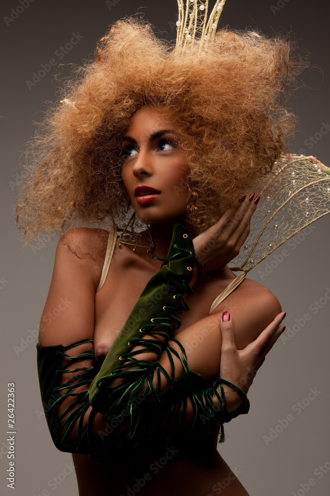 woman in crown with fashionable hair