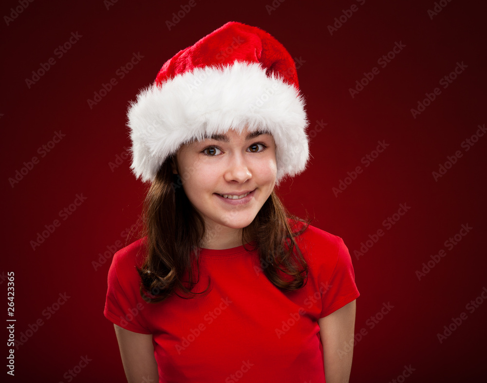 Christmas time - girl with Santa Claus Hat Christmas time - girl with Santa Claus Hat
