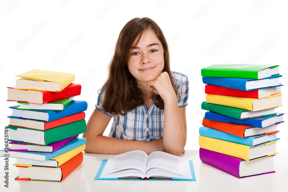 Girl between piles of books isolated on white background Girl between piles of books isolated on white background