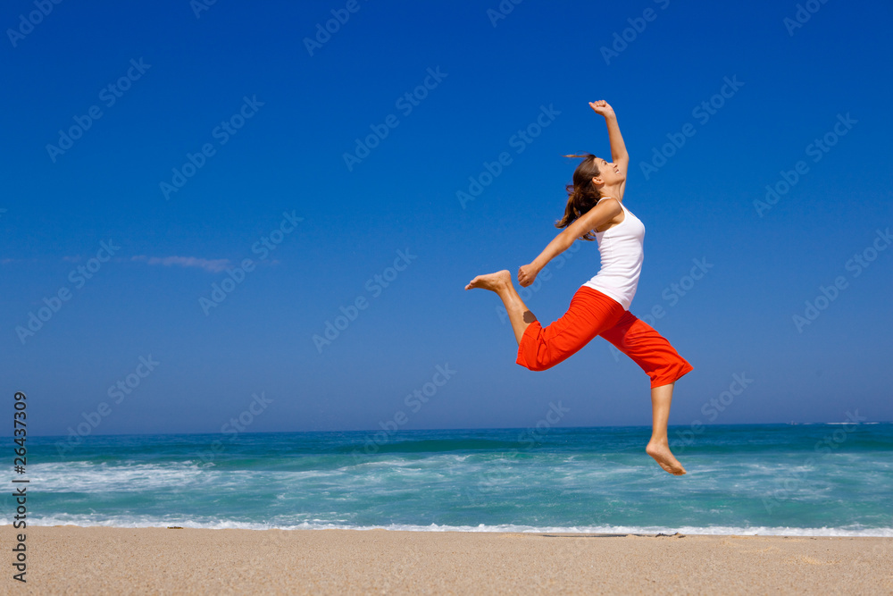 Young woman jumping