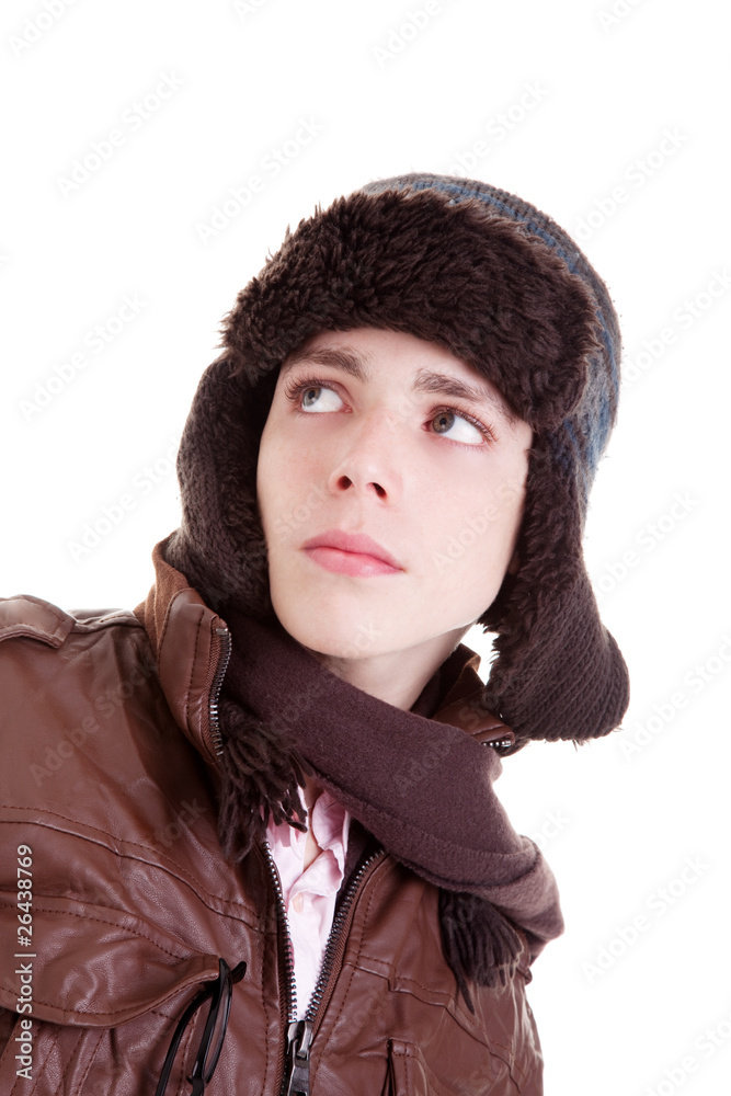 Young boy looking serious, with hat and winter clothes Young boy looking serious, with hat and winter clothes