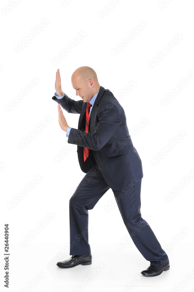 Businessman in full growth rests on the invisible wall Businessman in full growth rests on the invisible wall