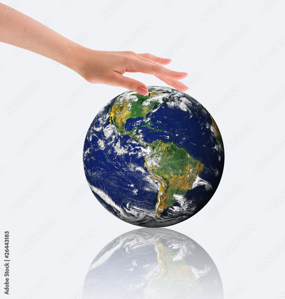 hands, the young sprout and our planet Earth