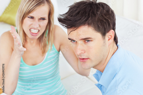 young man ignoring his girlfriend getting worked up © WavebreakMediaMicro